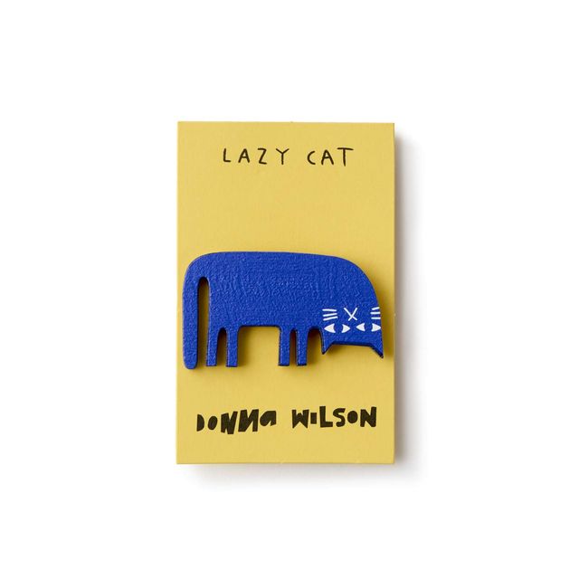 A yellow rectangular card featuring a blue cat silhouette with white whiskers, with the text 'LAZY CAT' at the top and 'DOWNA WILSON' at the bottom, shown on a white background.