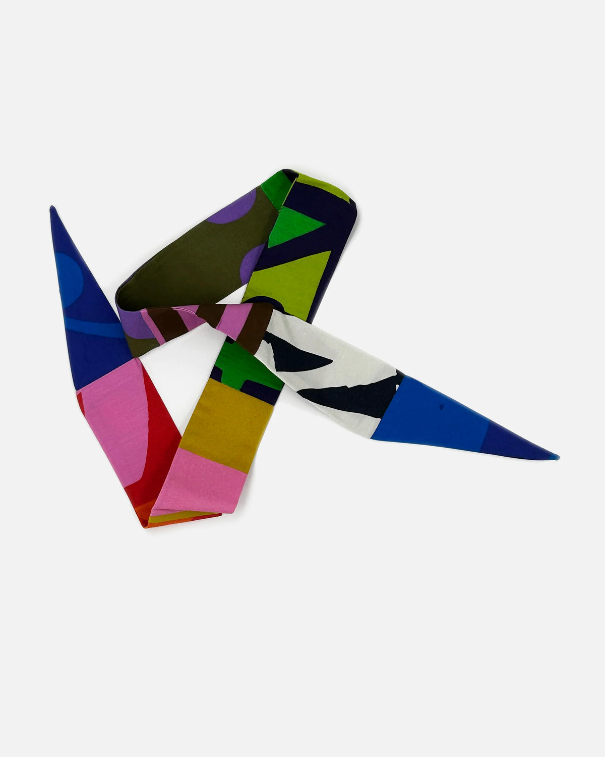A colorful geometric paper crane sculpture on a light gray background.