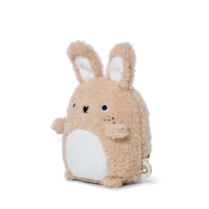 Plush toy rabbit with a white belly on a white background