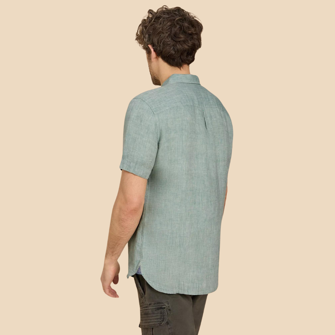 Men's short-sleeved, light teal linen shirt, viewed from the back.