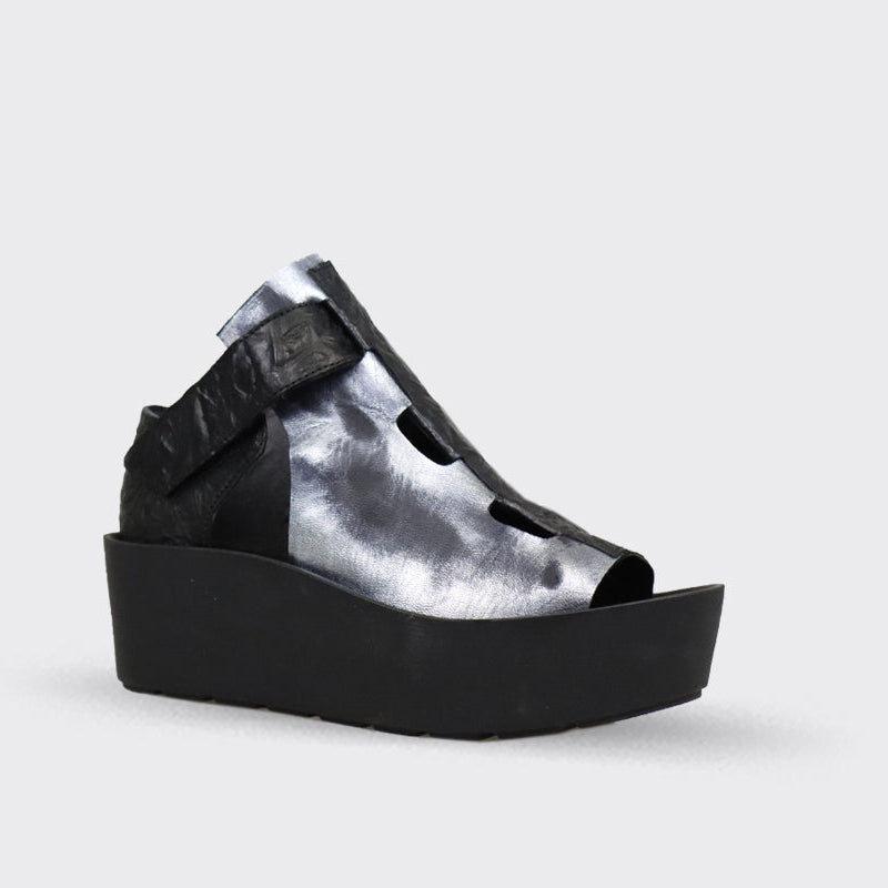 Silver and black leather platform sandal with an open toe and ankle strap.