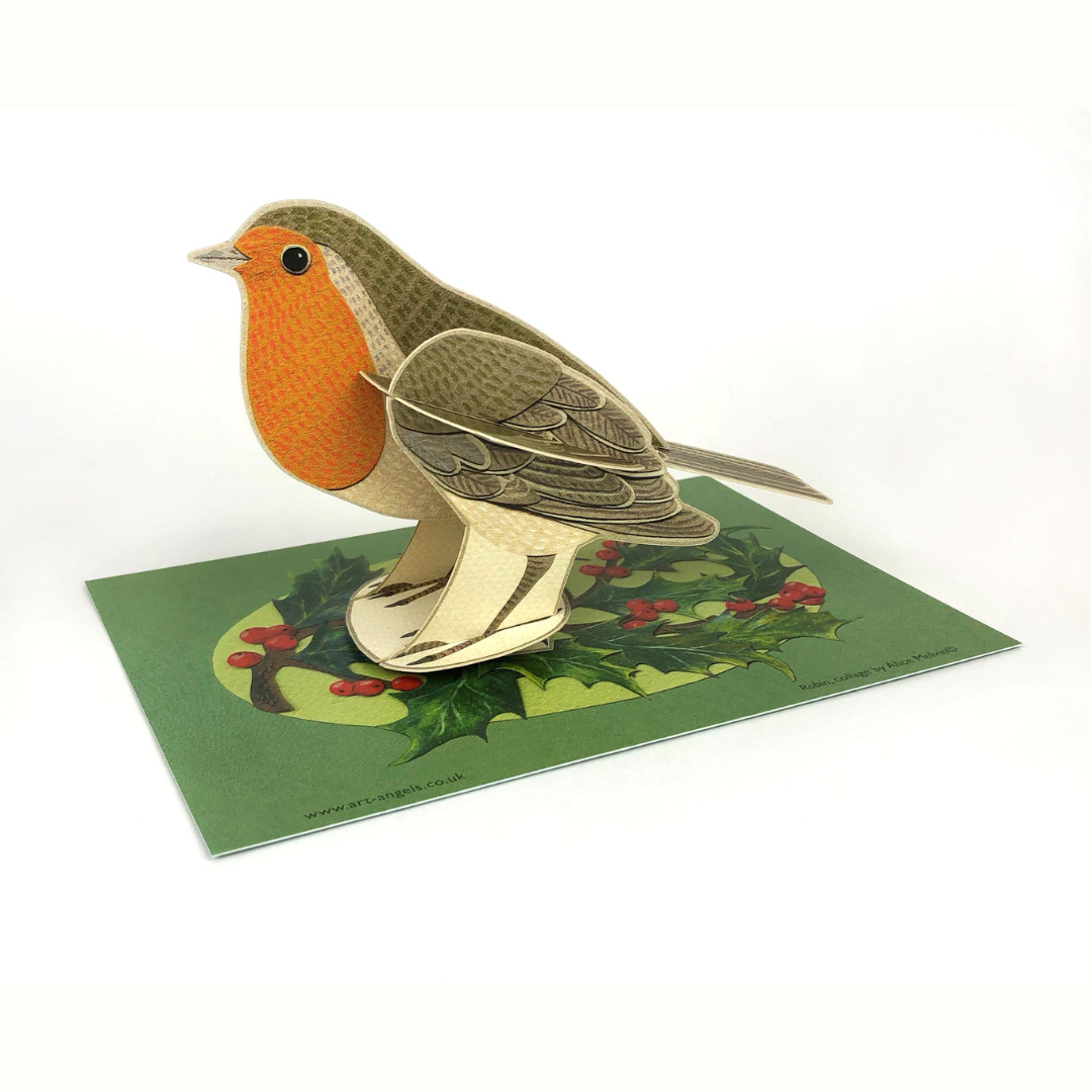 Pop-up card featuring a detailed robin illustration, standing on a holly-decorated base.