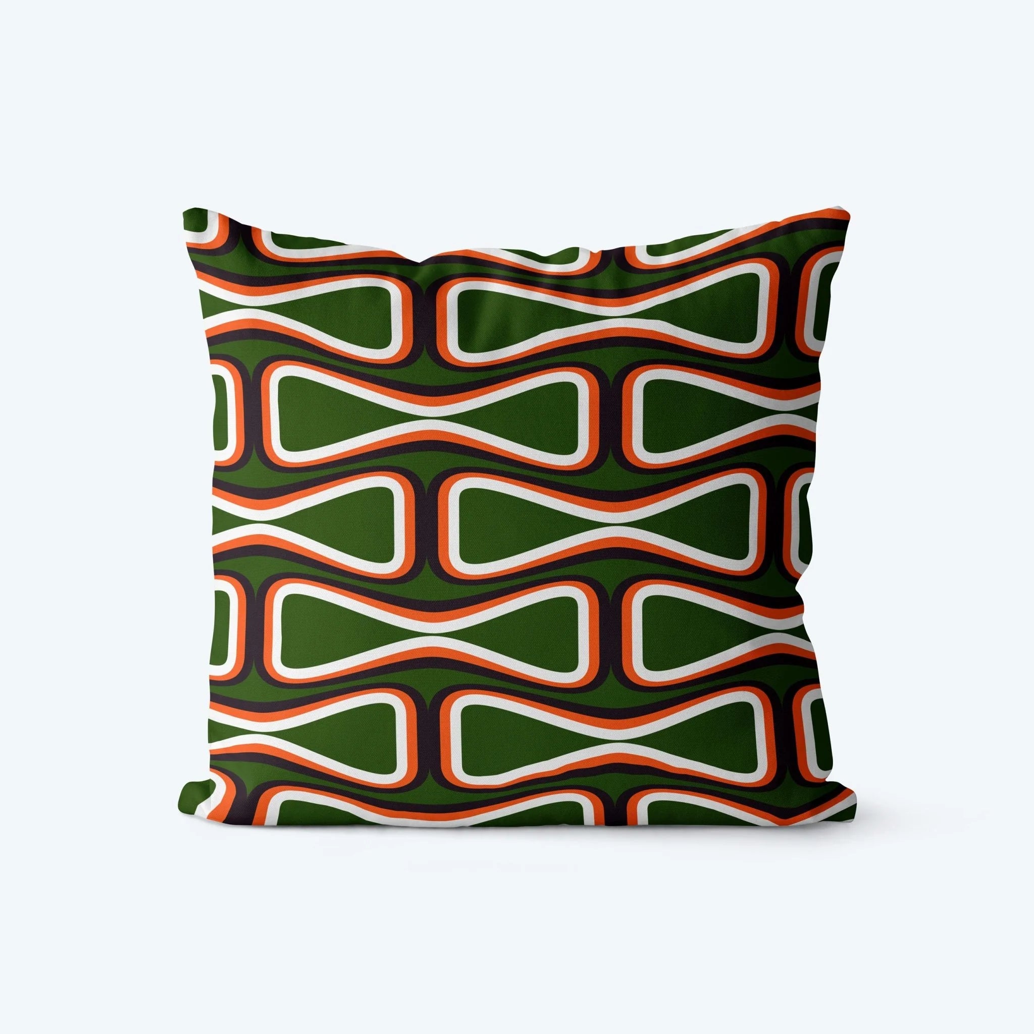 Decorative pillow with a green, orange, and white pattern on a white background