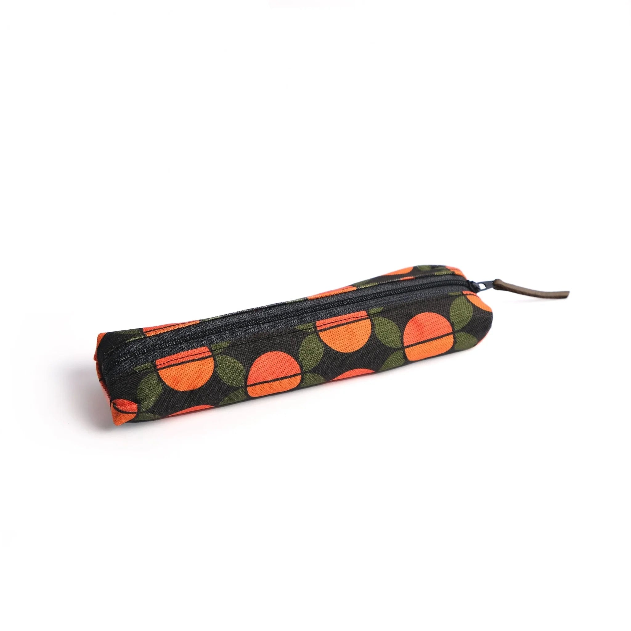 Pencil case with orange and green pattern on a white background