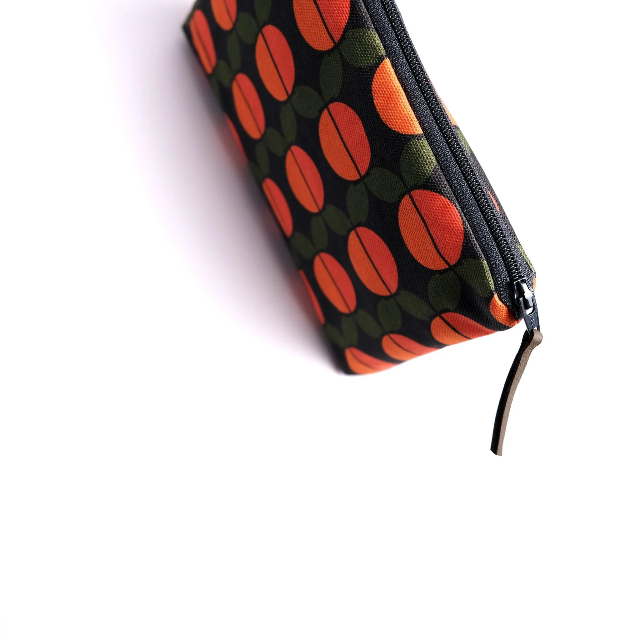 Pouch with orange and green pattern on a white background
