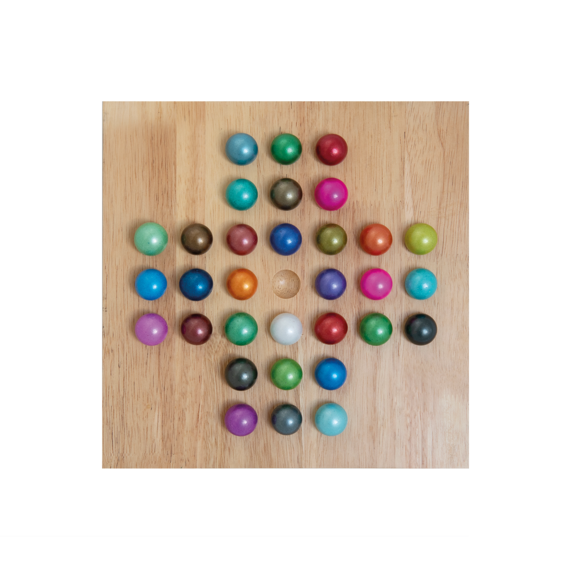 A set of 30 colorful wooden game pieces arranged in a cross shape on a light wood background.