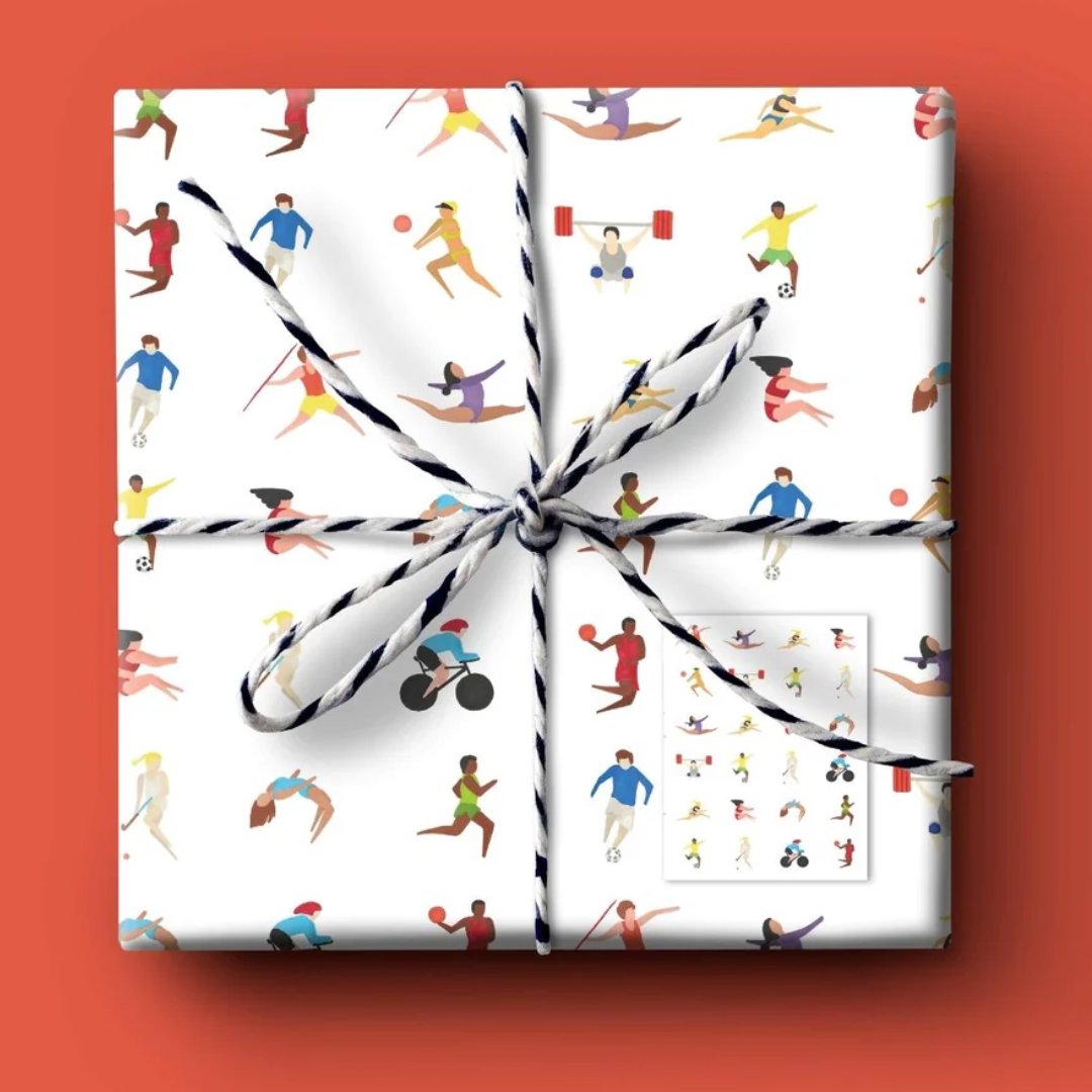 Gift wrap featuring a repeating pattern of diverse athletes participating in various sports.