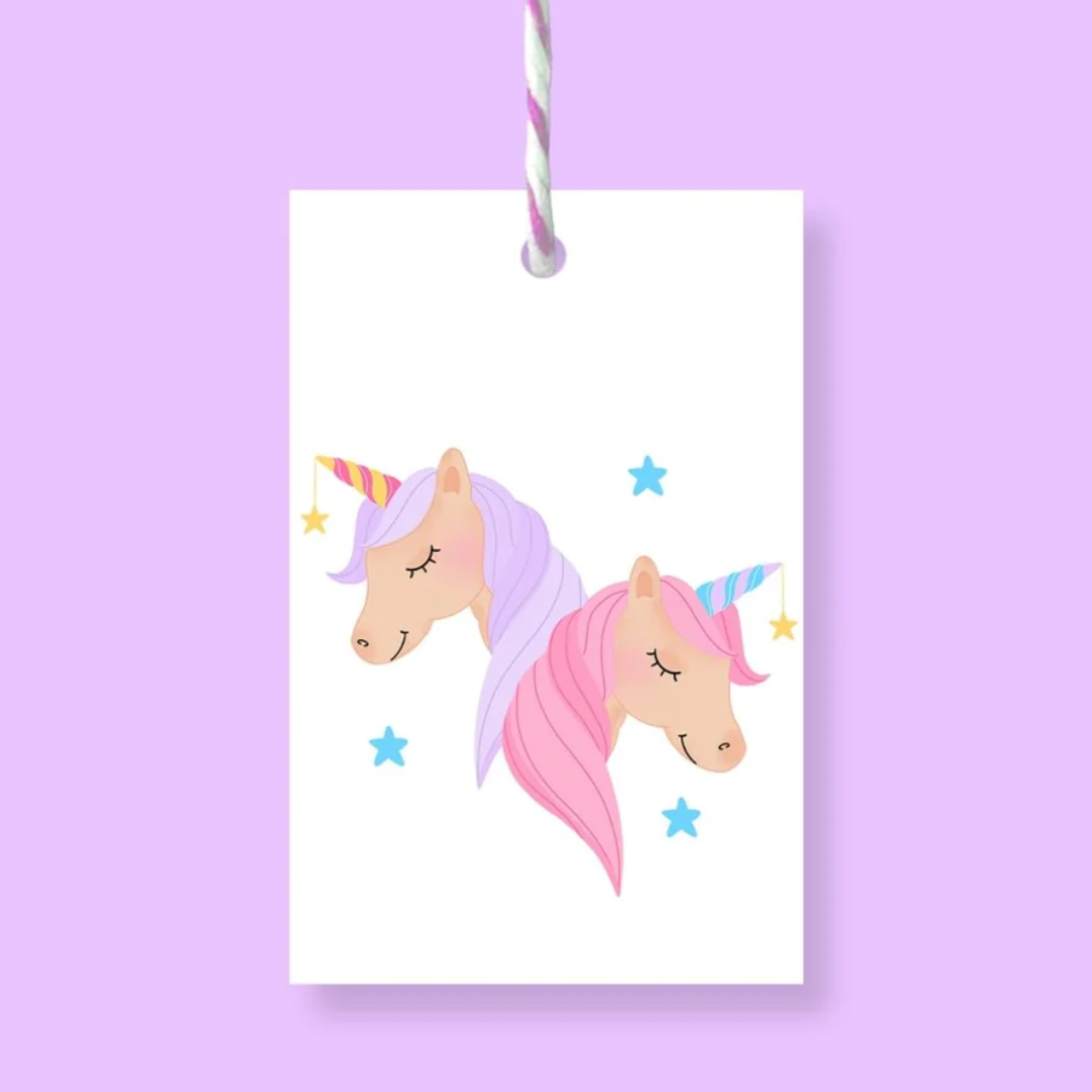 White gift tag with two pastel unicorns, one lavender and one pink, with rainbow horns and stars.