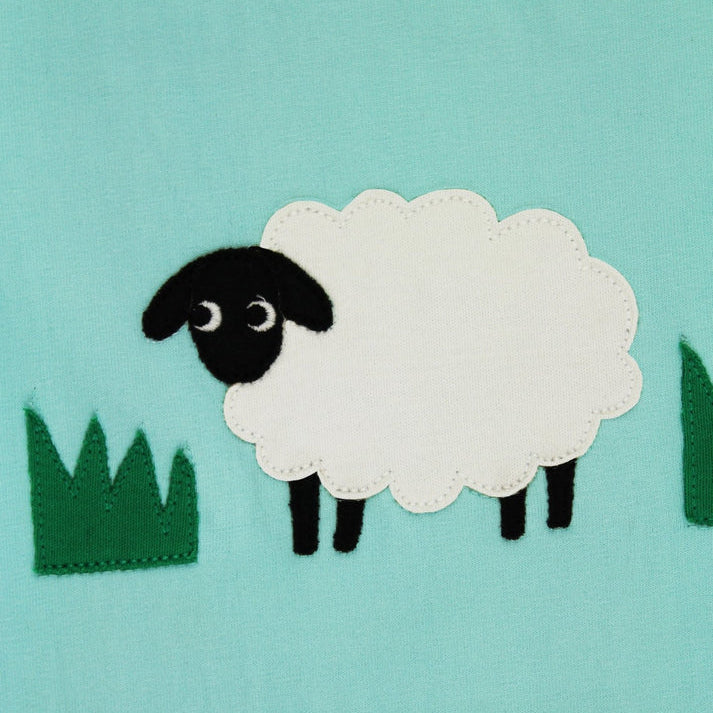 Sheep design on a light blue background