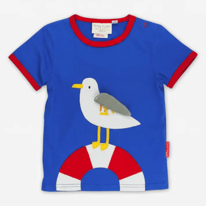 Blue t-shirt with a seagull and life buoy design on a white background