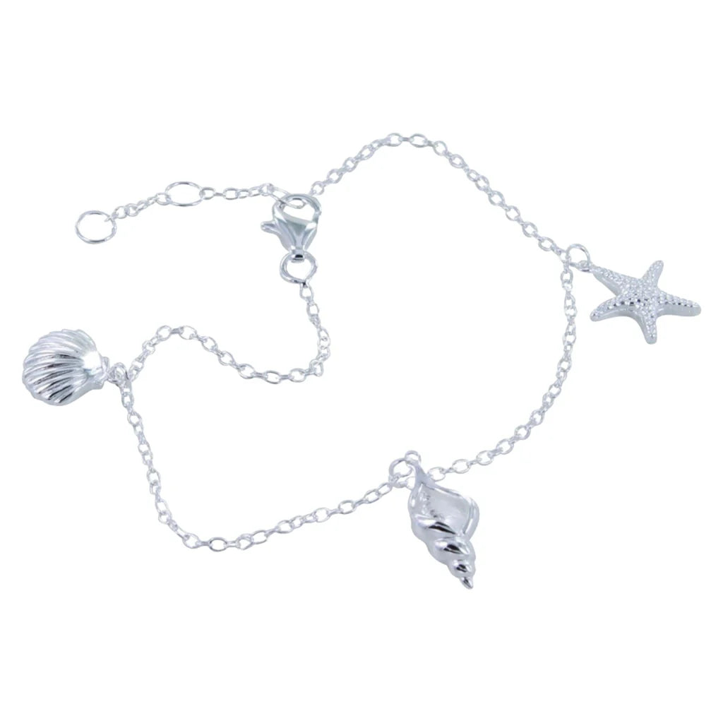 Silver anklet featuring a starfish and two seashell charms.