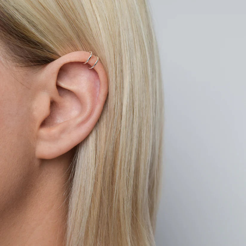 Silver double hoop ear cuff.