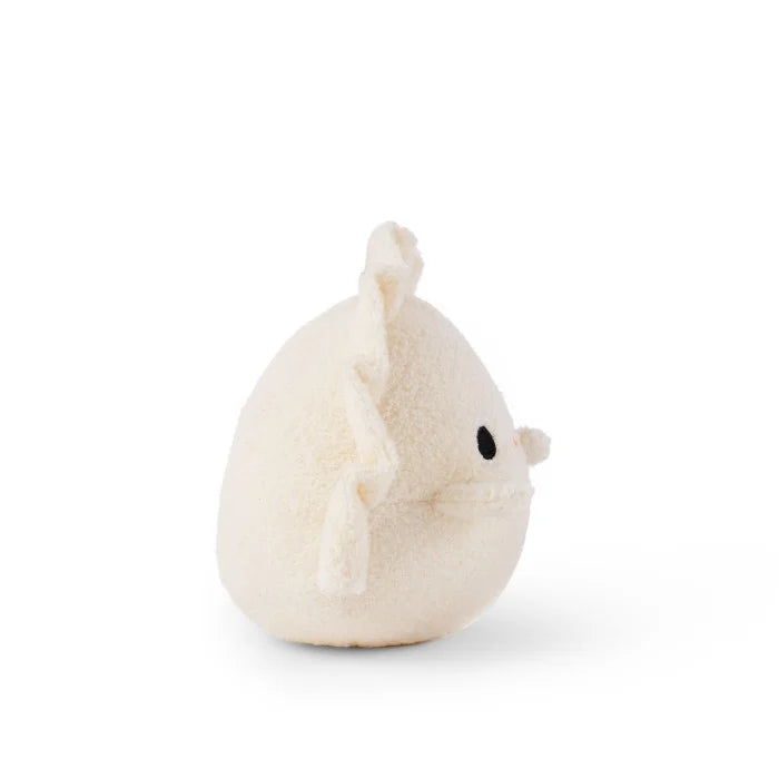 Small cream-colored plush toy on a white background