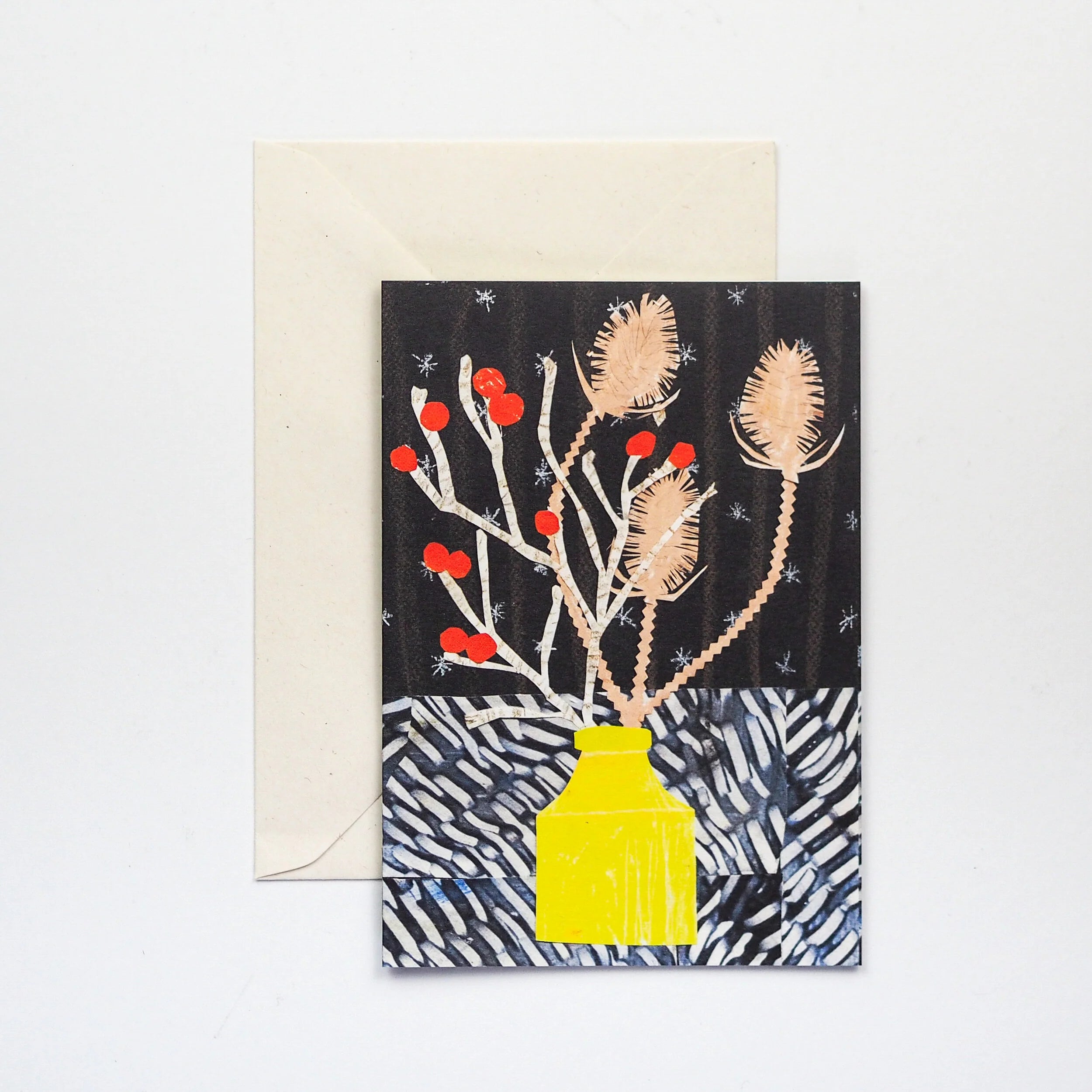 Collage-style greeting card depicting a yellow vase holding stylized winter flora with beige thistle heads and red berries