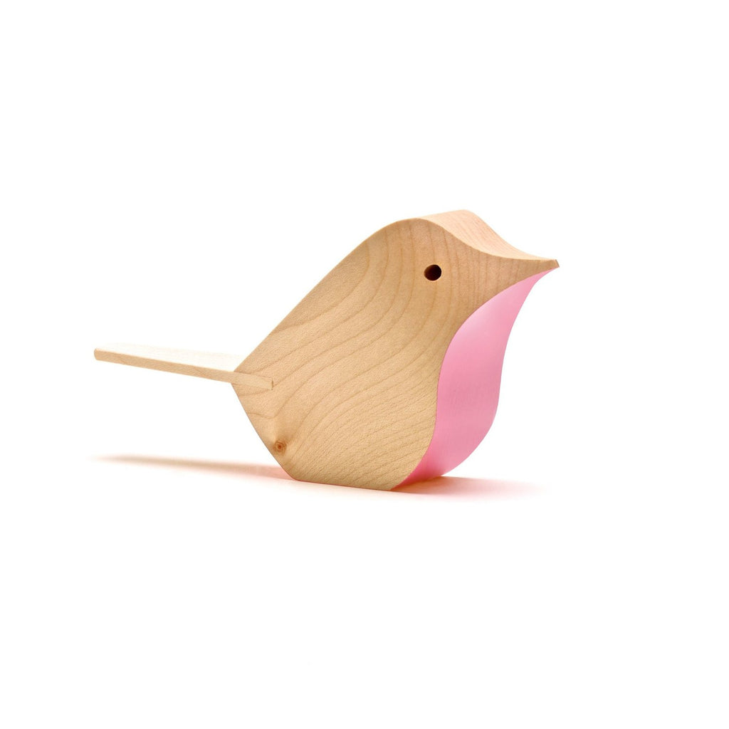 Wooden bird figurine with a light pink belly.  Simple, minimalist design.