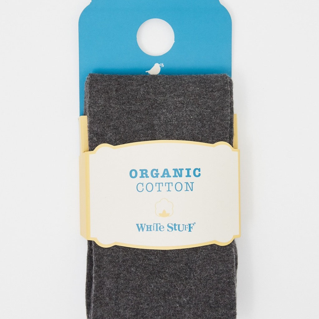 Dark gray organic cotton tights by White Stuff, packaged on a card.