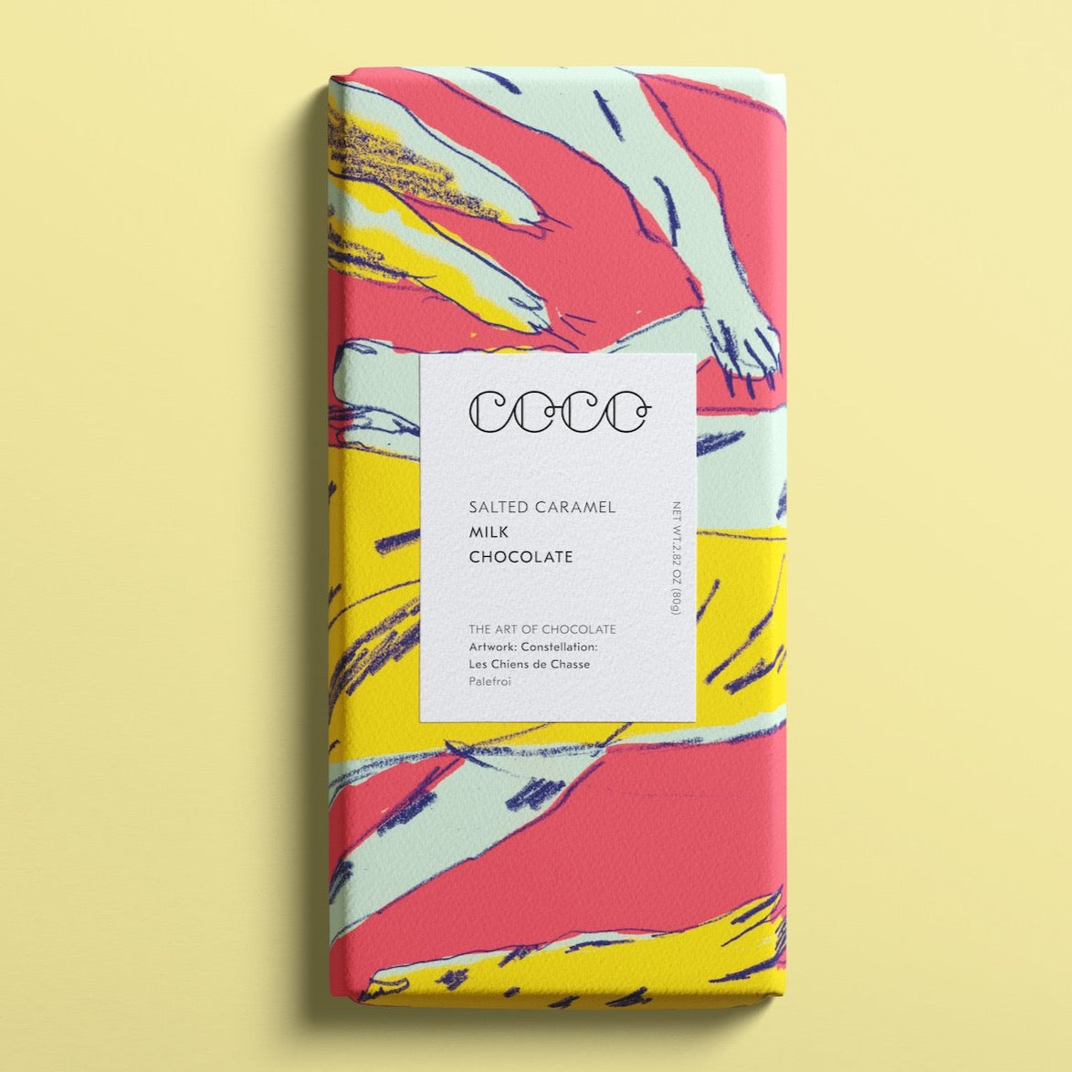 Salted caramel milk chocolate bar with colorful abstract artwork on packaging.