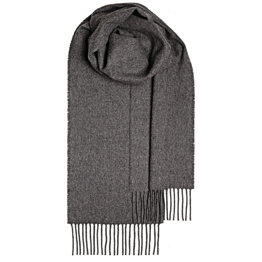 Dark gray wool scarf with fringed edges, loosely folded.