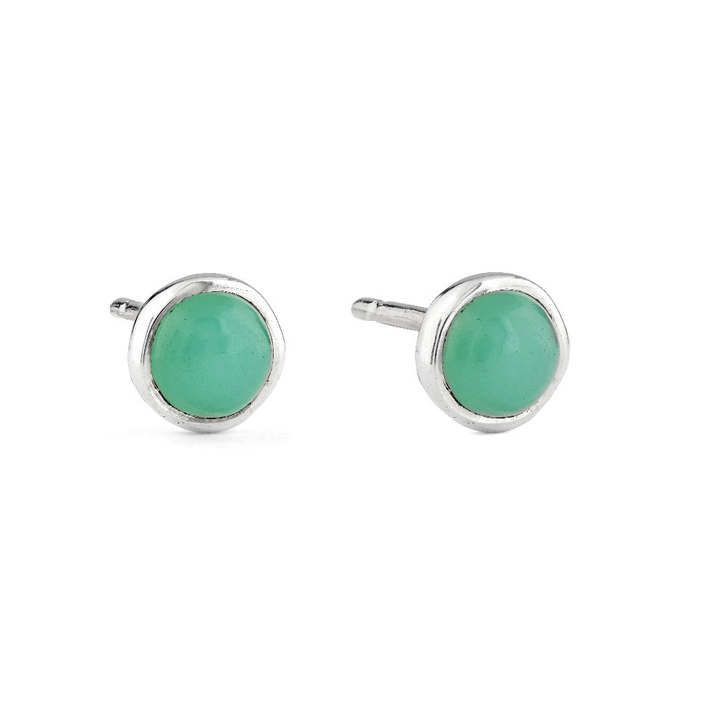 Pair of sterling silver stud earrings featuring round, light green gemstones.