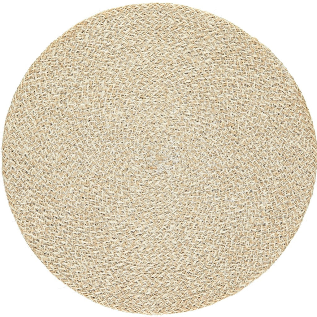 Round, woven placemat in light beige.  The texture is tightly woven with a slightly irregular pattern.