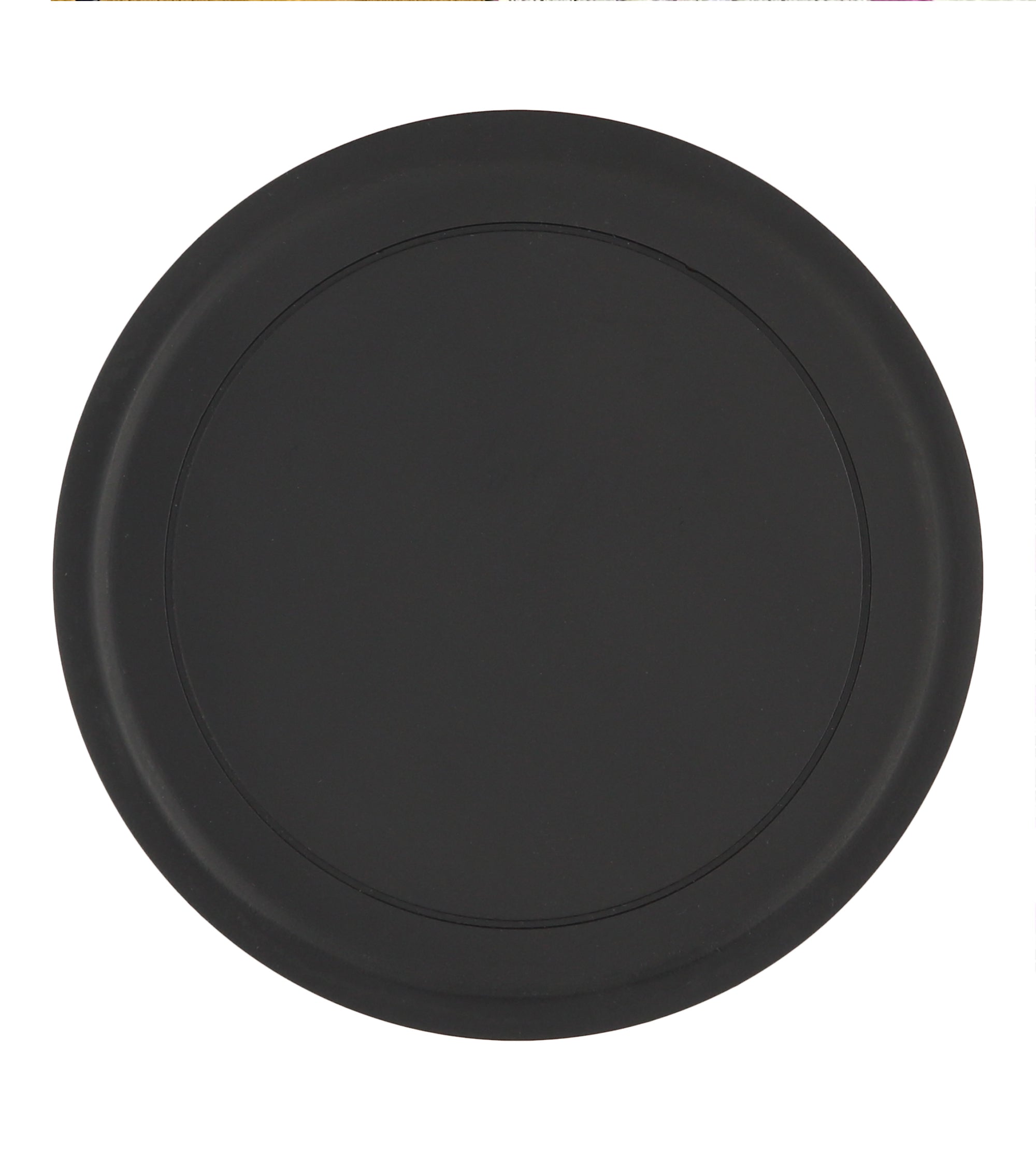 Black circular wireless charging pad with a slightly recessed charging area.