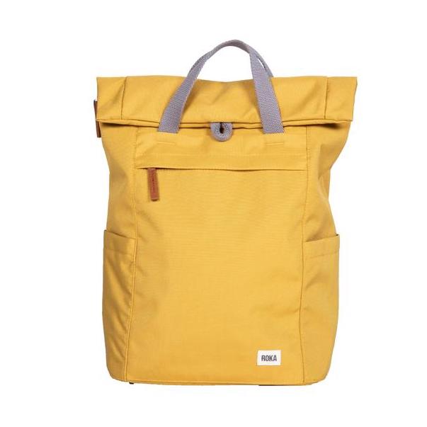 Mustard-yellow roll-top backpack with gray handles and a small front pocket.