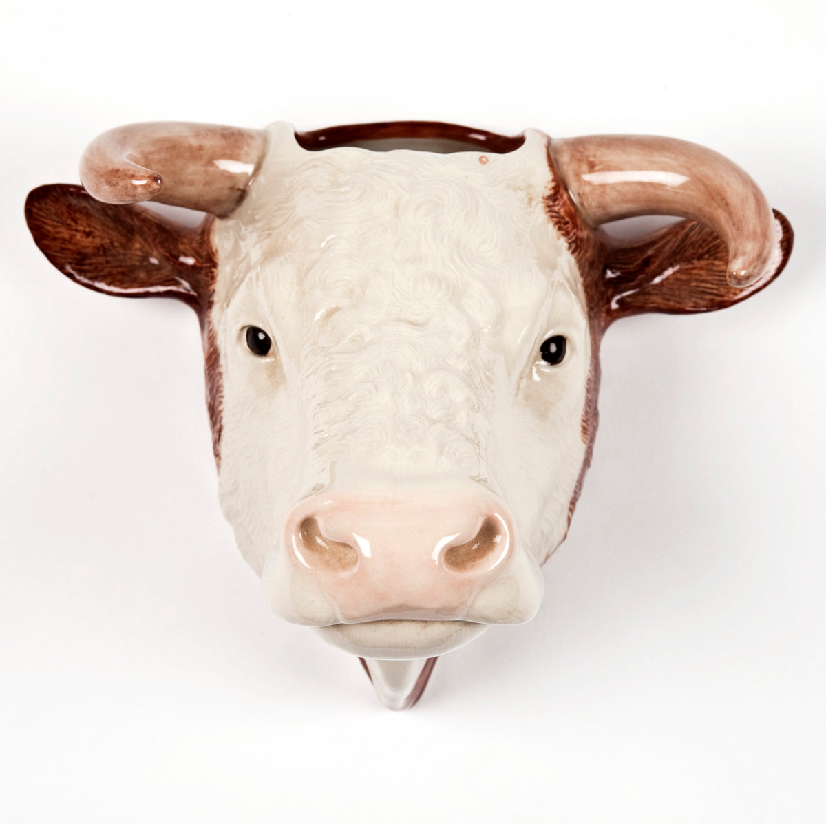 Ceramic bull head wall planter; off-white face, brown horns and ears.