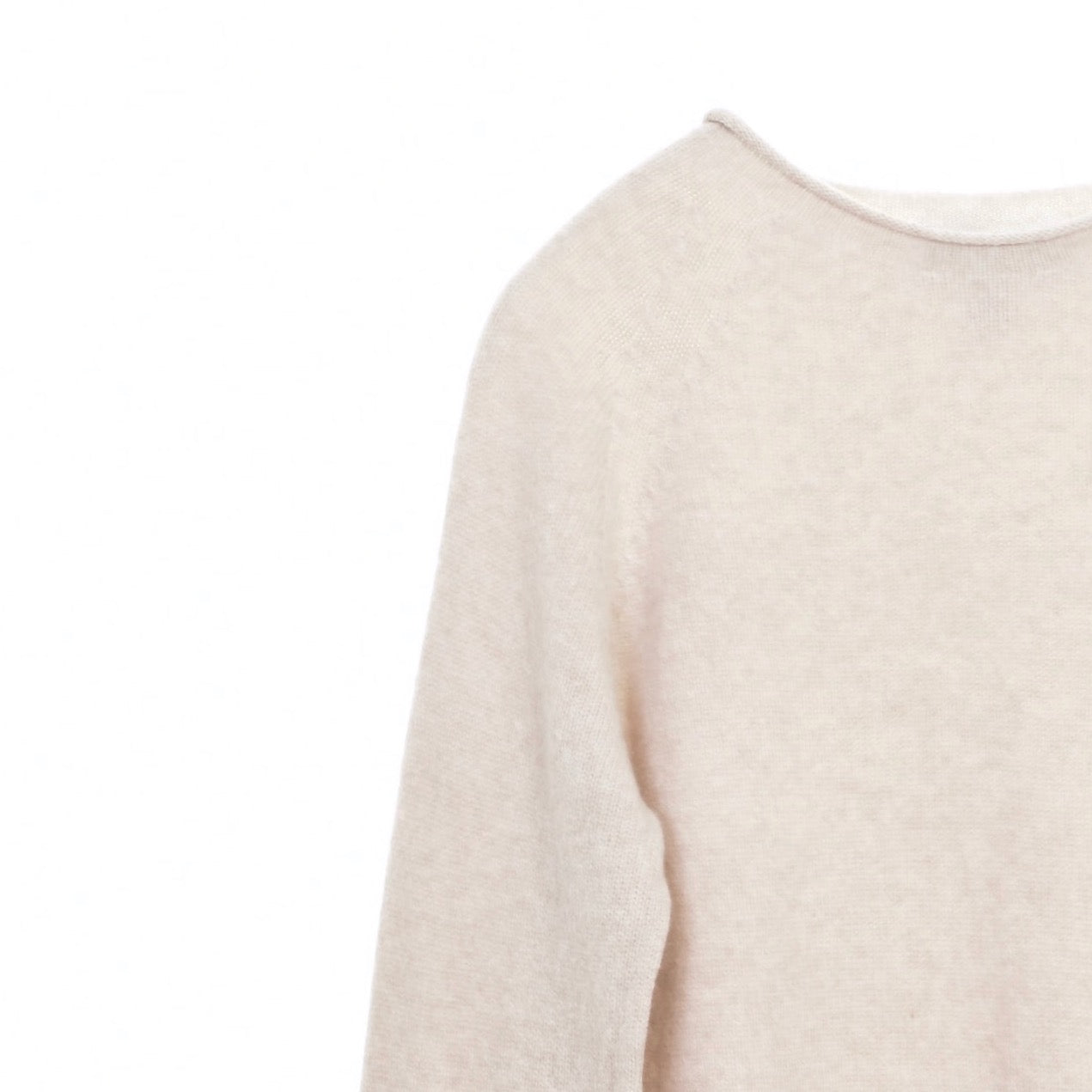 Off-white cashmere sweater with a boat neckline and long sleeves.