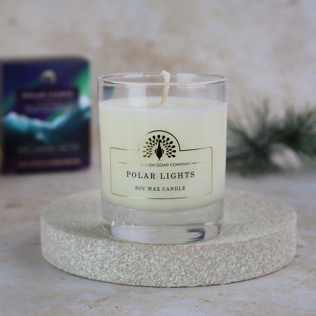 Off-white soy wax candle in a clear glass jar.  The label reads "Polar Lights" and "The English Soap Company".