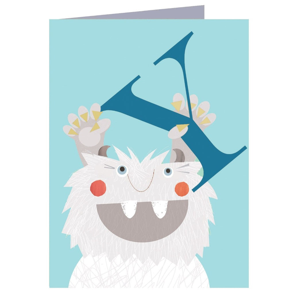 Greeting card featuring a friendly, furry monster holding a large teal letter Y above its head.