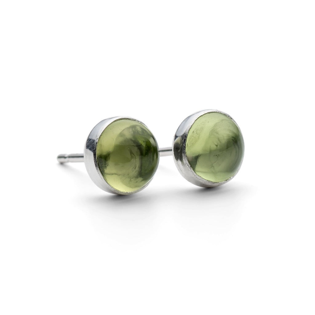 Pair of olive green gemstone stud earrings with silver settings.