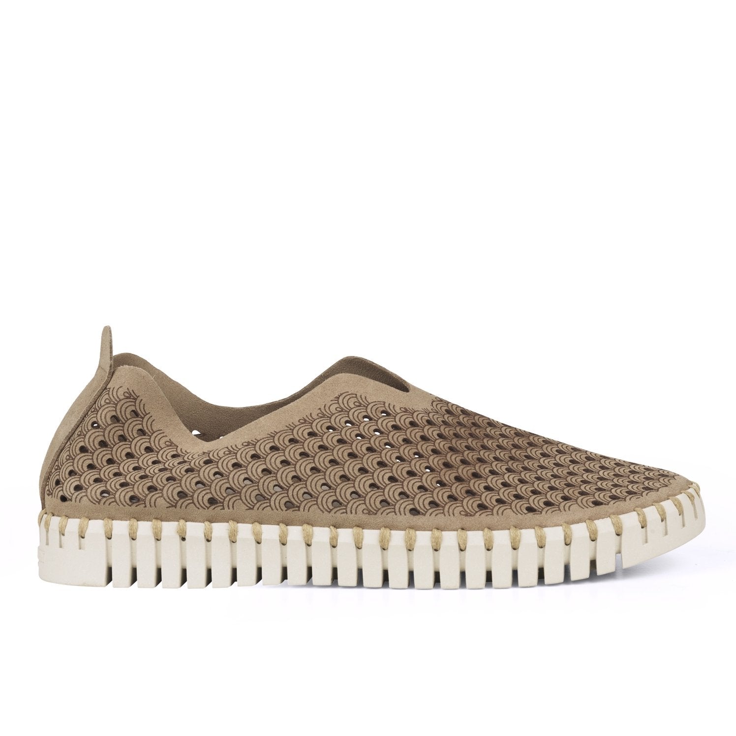 Tan slip-on shoe with a textured, wave-patterned upper and a white, ridged sole.