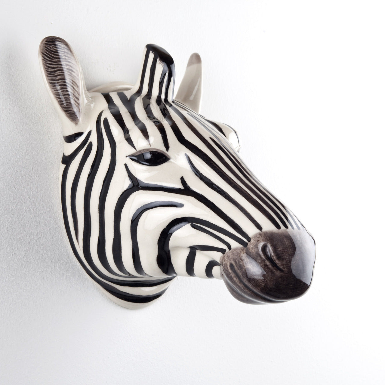 Ceramic zebra head wall planter; black and white stripes, glossy finish.