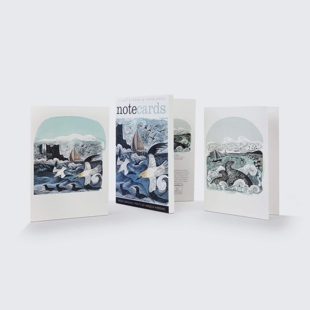 Set of 10 notecards and envelopes featuring linocut prints of seascapes with birds and sailing boats by Angela Harding.