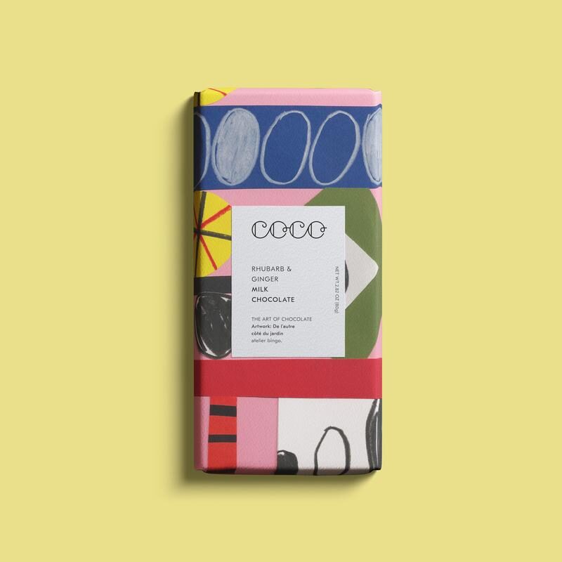 Coco Rhubarb & Ginger Milk Chocolate bar with colorful abstract artwork on the packaging.