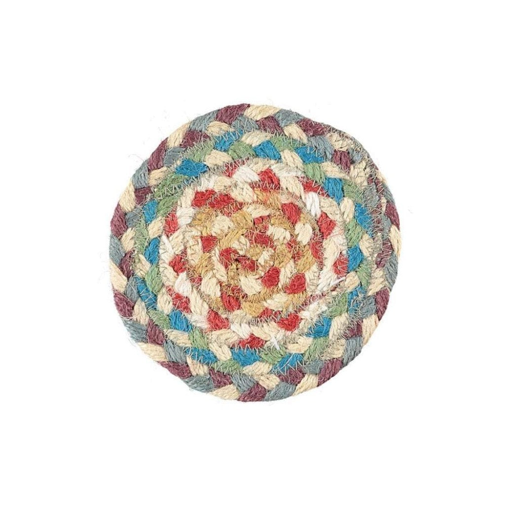 Round braided jute coaster in multicolored stripes of red, beige, teal, and purple.